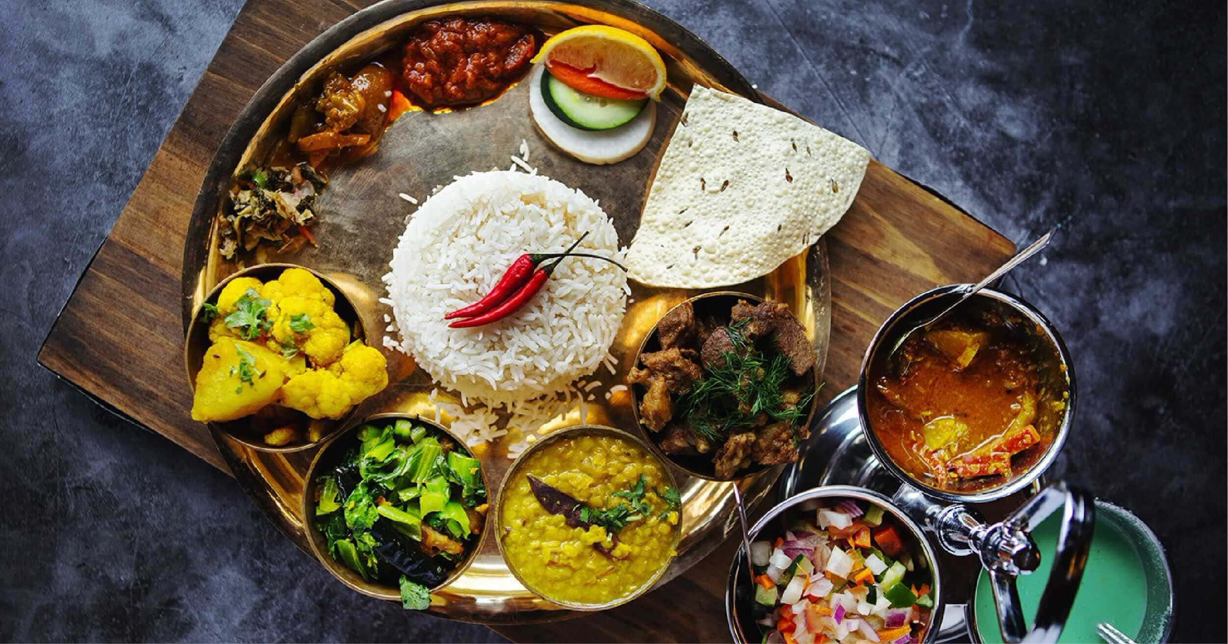 du lịch nepal Ẩm thực Nepal nổi bật với món dal bhat, momo và các món cà ri đậm hương vị bản địa